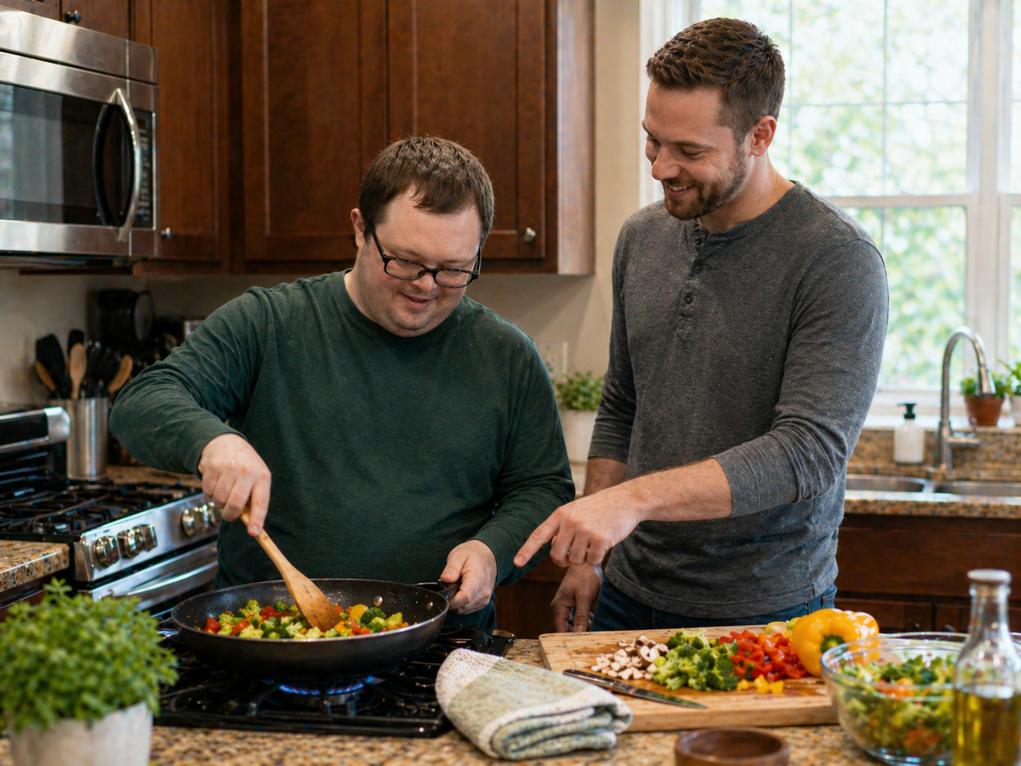A DSP and customer sharing a cooking moment in the kitchen
