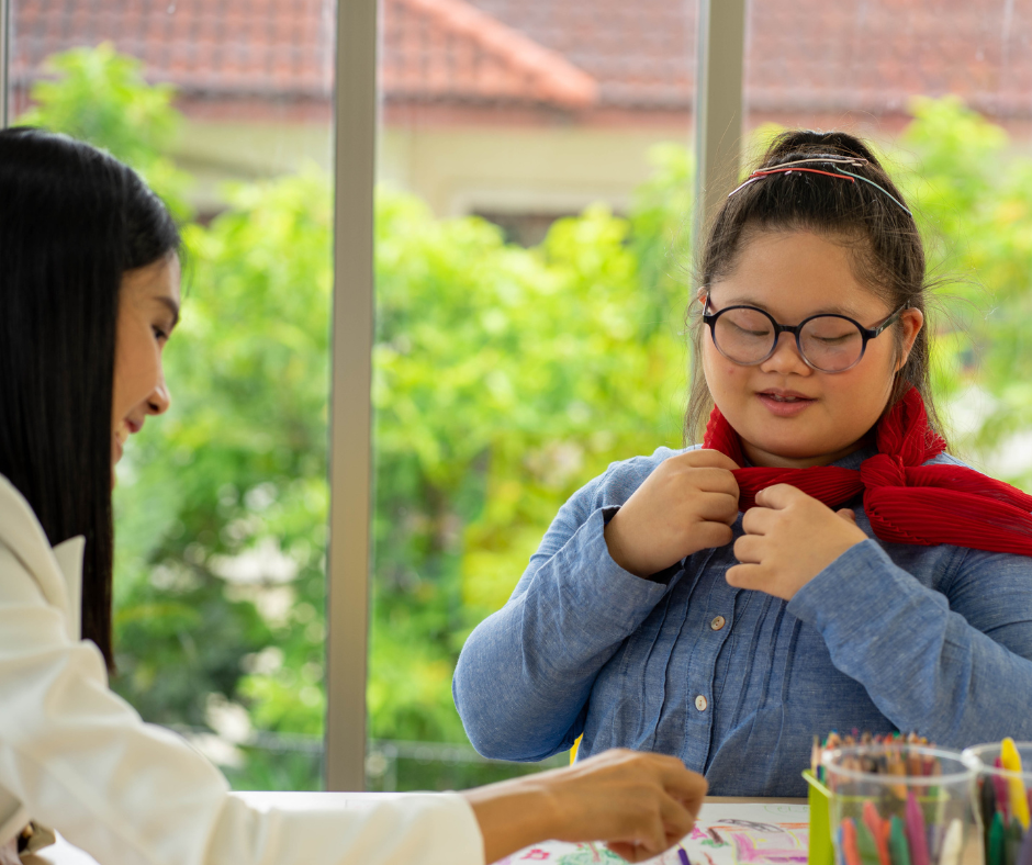 A Direct Support Professional and adult customer connect during a community-based support activity.