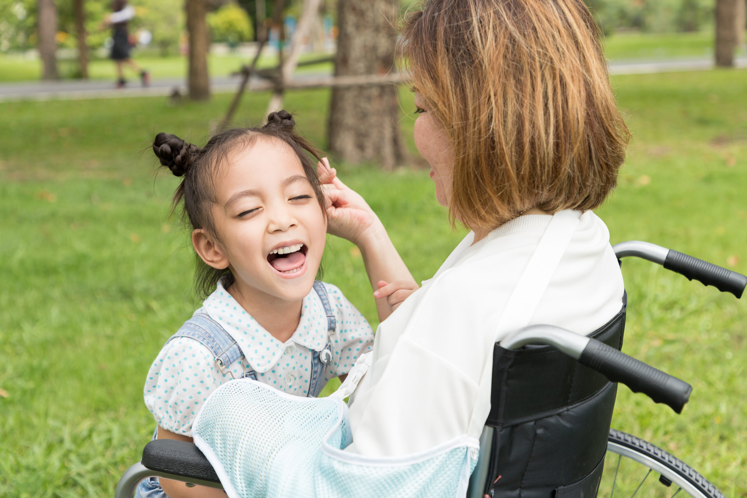 A young girl spending time with her grandmother at home