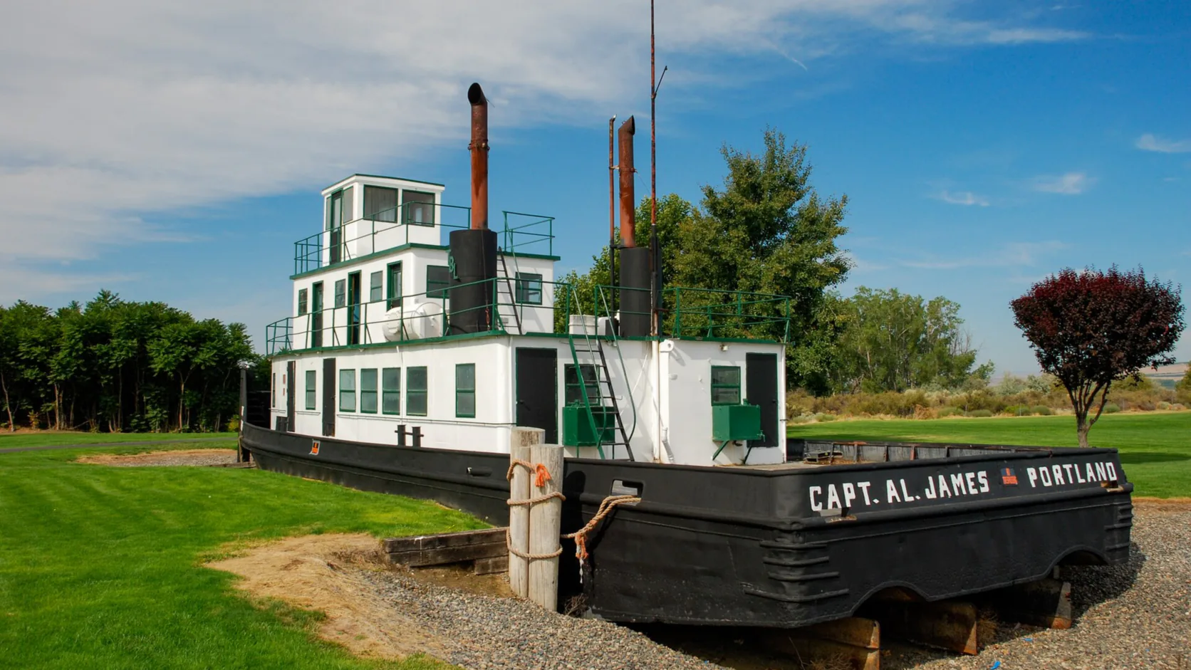 A historic sternwheeler on display beside lawns at Boardman on the Columbia River, Morrow County